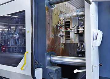 Small Image of an Injection Molding Machine used for Plastic Parts Manufacturing for Injected Plastic Parts in Iowa - Stuke Iowa Plastic Parts Fabrication